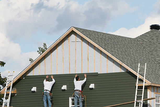 Professional Siding technician working in Brodnax, VA